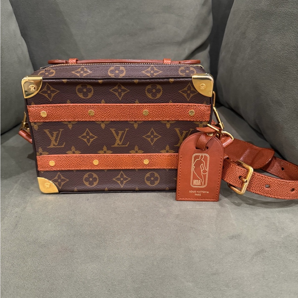 Louis Vuitton x NBA Monogram Collaboration handle Soft Trunk.